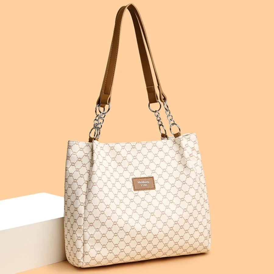 Brown retro fashion women's handbag made from soft PU leather with polyester lining