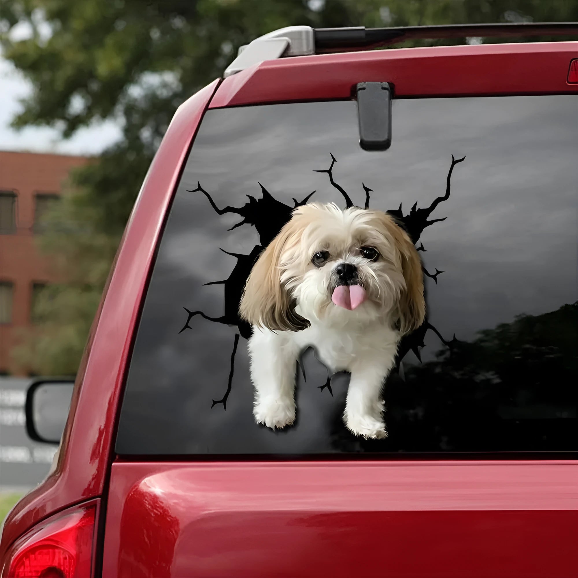 Reflective torn-body dog silhouette car window sticker in three sizes.