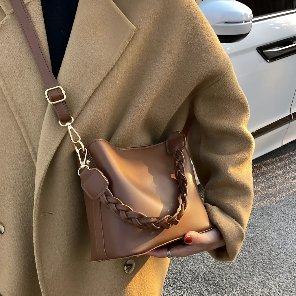 Retro woven PU one-shoulder crossbody underarm bucket bag in khaki colour.