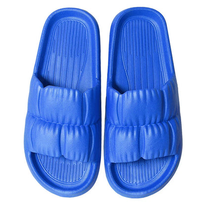 Plush Bathroom Slides in various colors and designs, featuring a soft, comfortable EVA sole and breathable upper material.