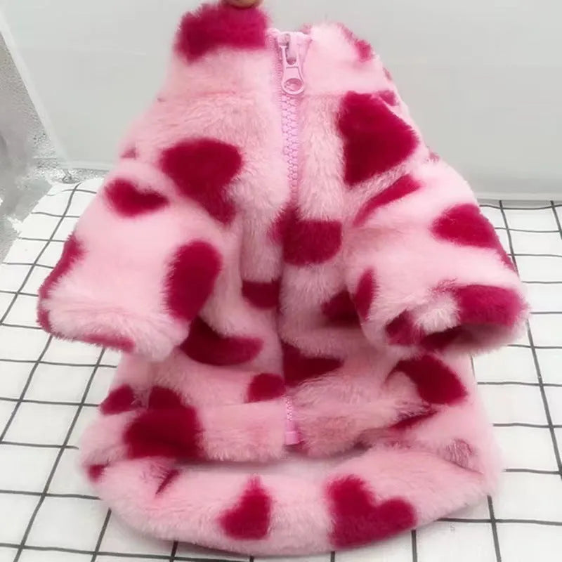 Small dog wearing pink plush winter coat for teddy, bichon or pomeranian breeds