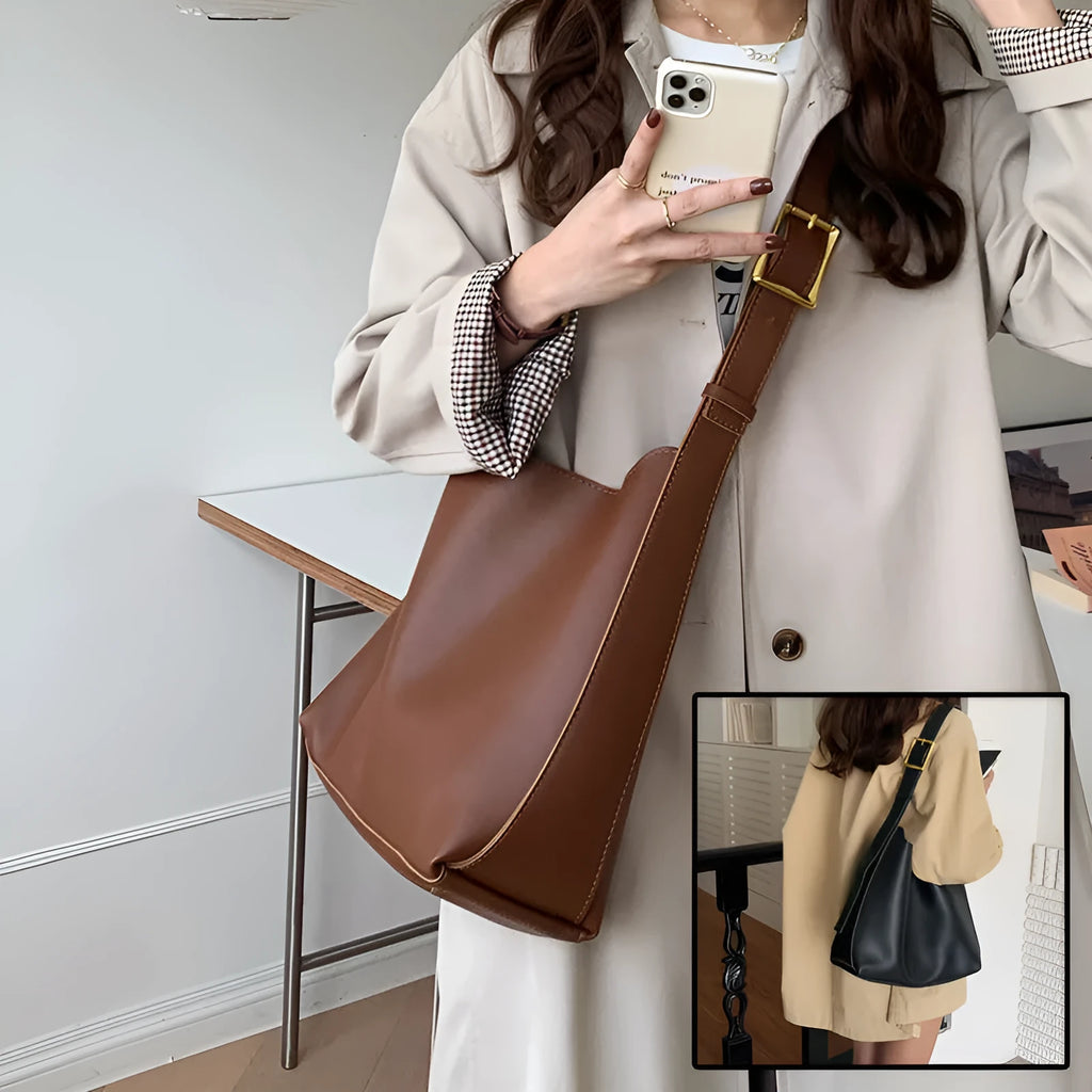 Women's solid colour PU leather shoulder bag in black, square vertical shape with sewing thread detail and single strap