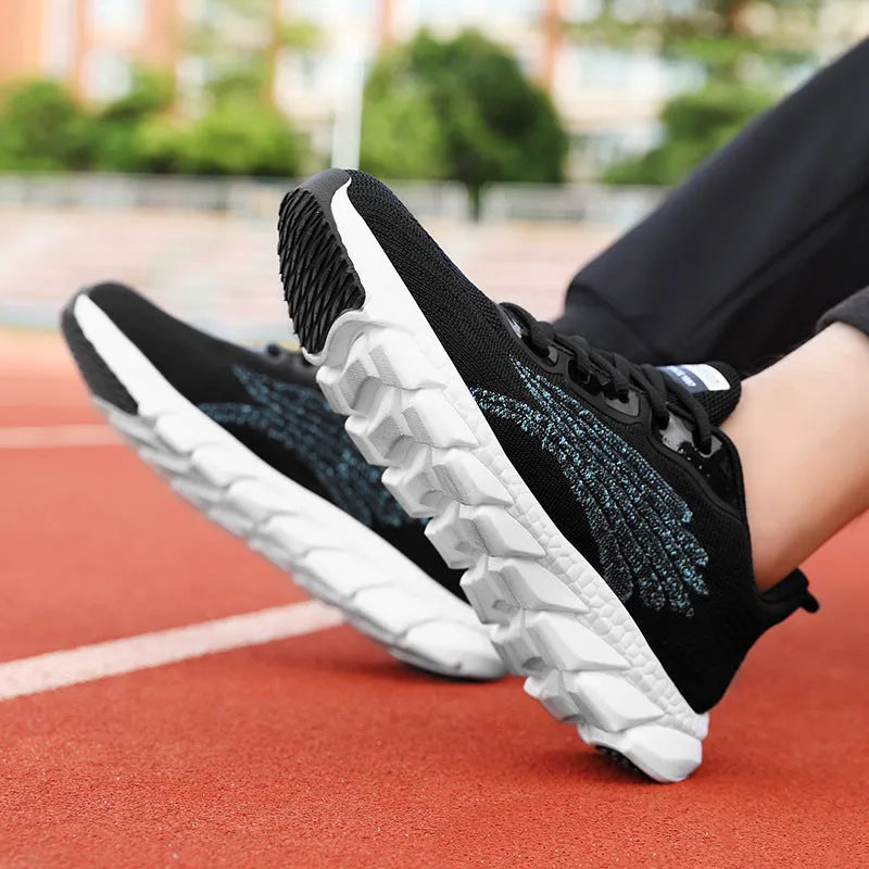 Women's low-top flat sneakers with cross-strap design in black and white colours