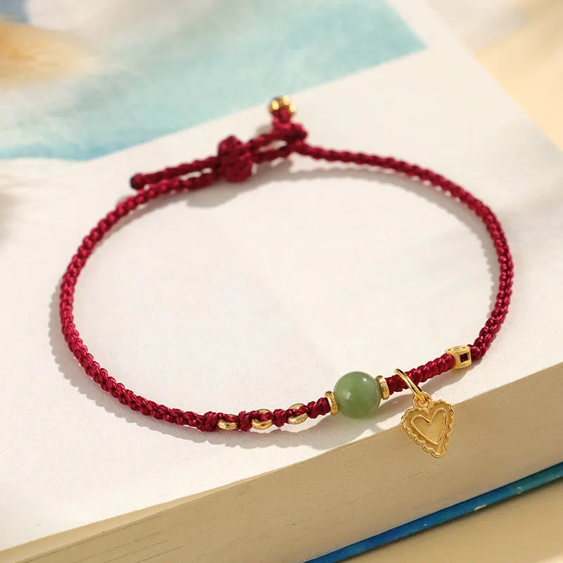 Handmade 925 silver and Hetian jade bracelet with adjustable woven strap