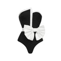 Women's black and white colour-block one-piece swimsuit with asymmetric bow and irregular tube top
