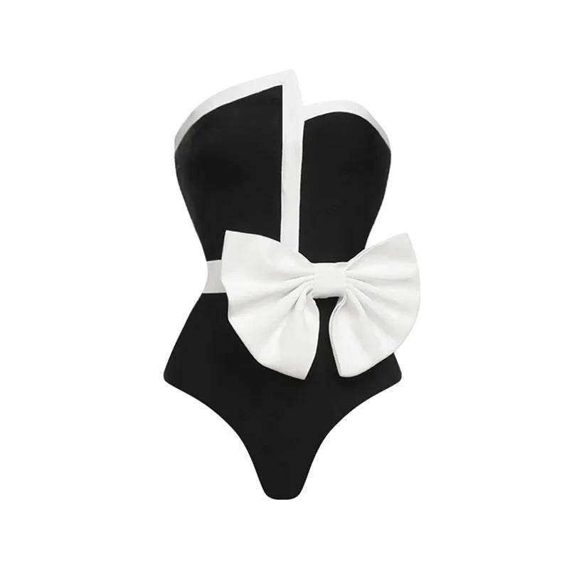 Women's black and white colour-block one-piece swimsuit with asymmetric bow and irregular tube top