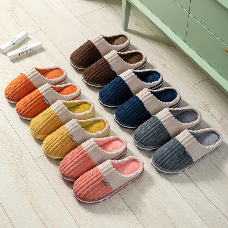 Unisex winter slippers in candy colour, suede upper, TPR sole, Baotou style, on a clean background.