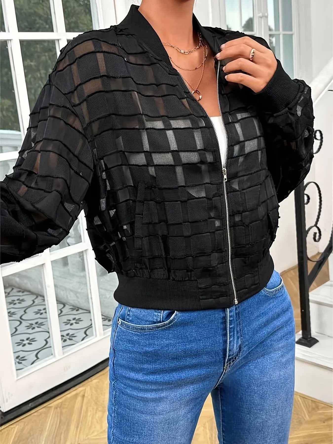 Black semi-transparent women's casual jacket with geometric pattern and front zipper closure