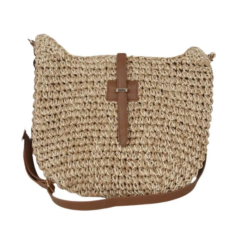 Beige handmade woven bag with a special-interest design and a long shoulder strap.