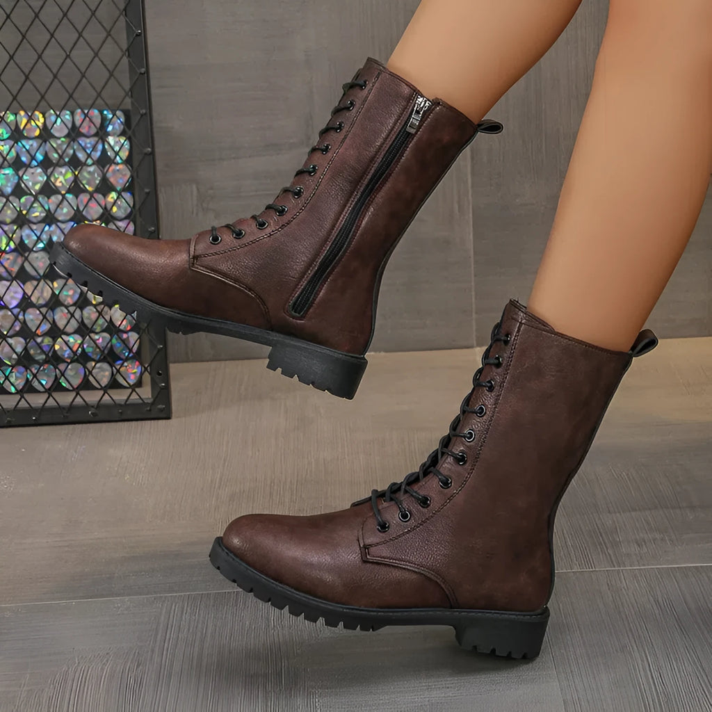 Women's flat mid-calf lace-up boots in brown with artificial PU upper and hollow design detail