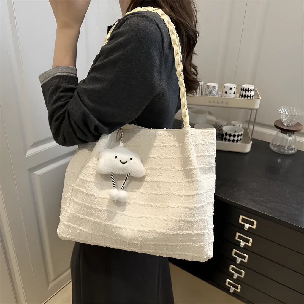 Women's canvas shoulder messenger bag large bucket shape with magnetic clasp and phone pocket, available in black, blue, pink, white.
