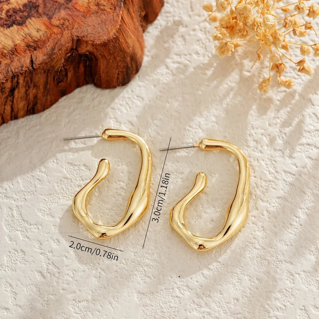 Irregular shaped minimalist drop earrings for women in gold colour metal