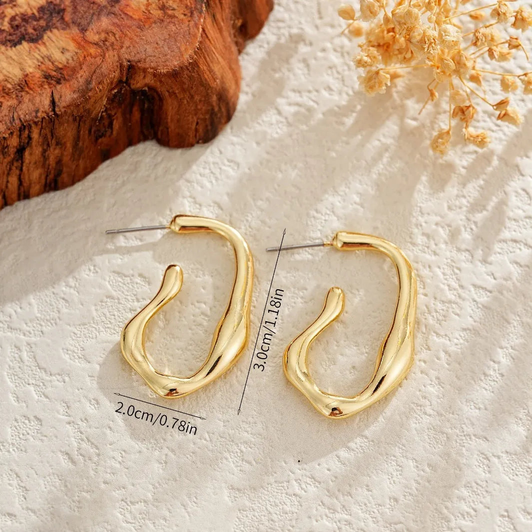 Irregular shaped minimalist drop earrings for women in gold colour metal