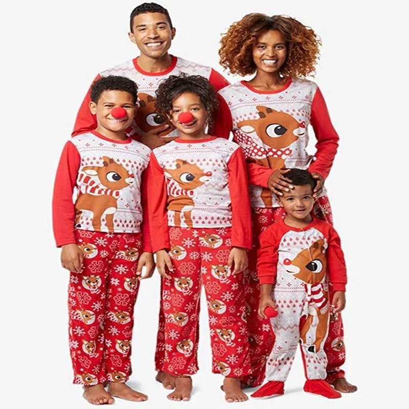Cozy Christmas family pajamas with a cute fox print pattern, perfect for holiday celebrations and snuggling up by the fire