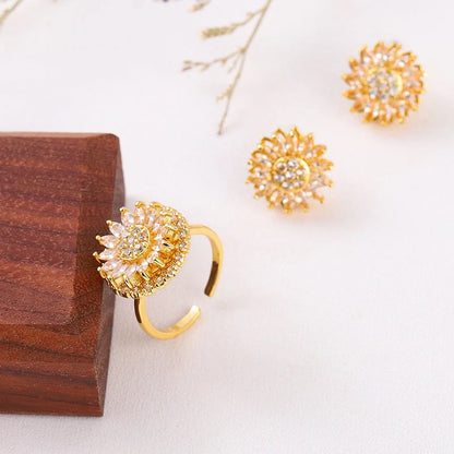 Sunflower-themed stainless steel jewellery set with zircon accents, including necklace, earrings, and ring