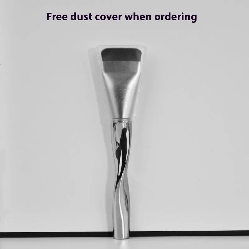 Spiral-shaped black powder foundation brush with velvet puff in pineapple-design storage box