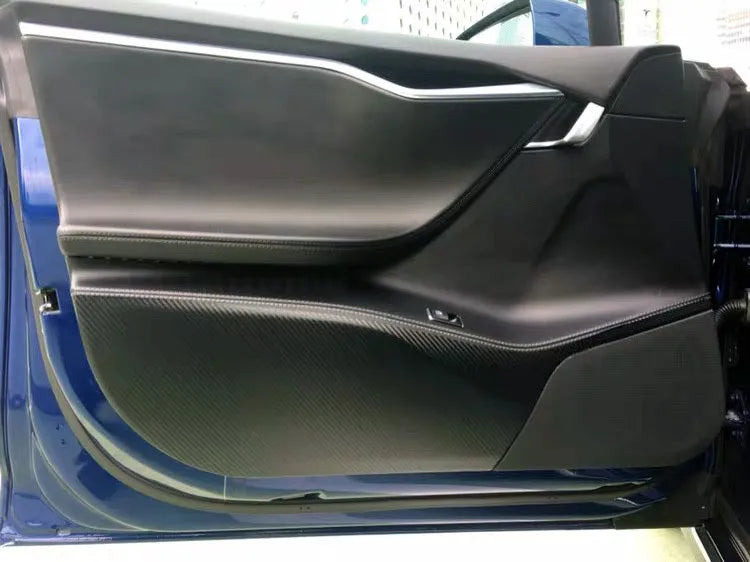 Carbon fibre pattern protective film for Tesla Model S door panels showing four pre-cut pieces