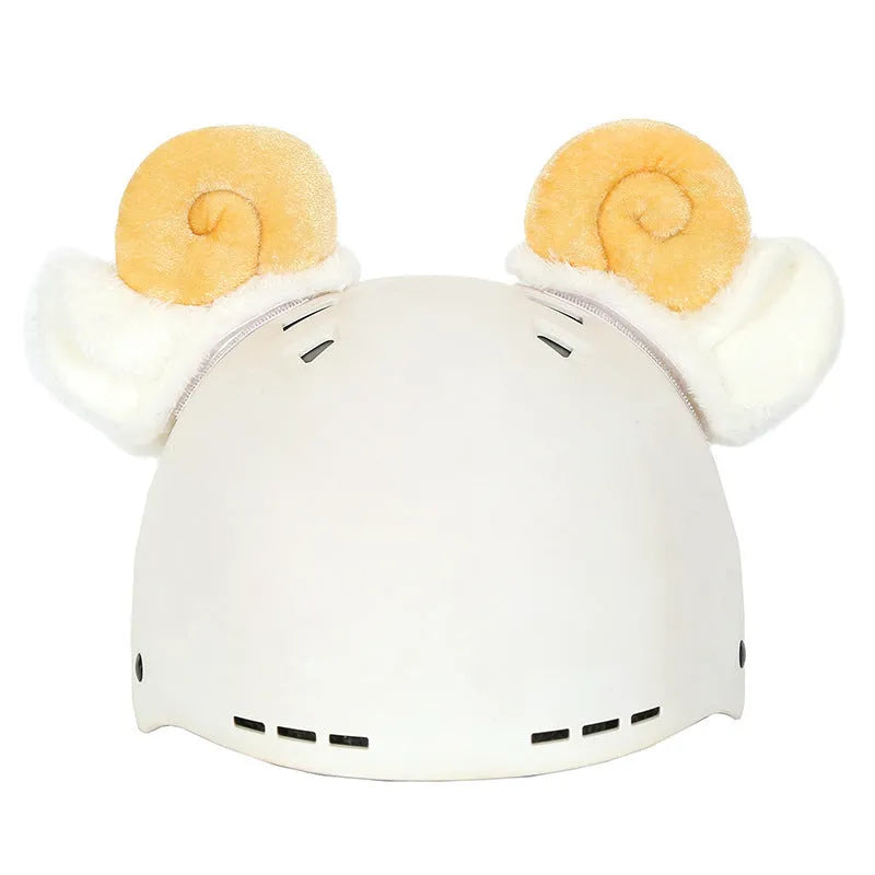 Plush fabric cartoon character decorative cover on a ski helmet.