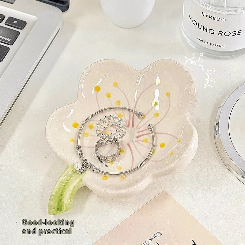 Yellow porcelain ornamental tray with optional night light, shown with white and pink shell options.