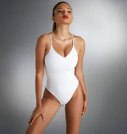 Stylish backless one-piece swimsuit for women in various vibrant solid colors