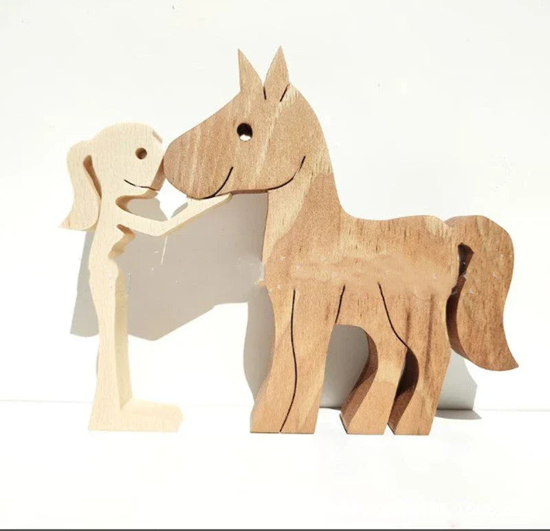 Handcrafted wooden dog sculpture featuring a man and his loyal canine companion