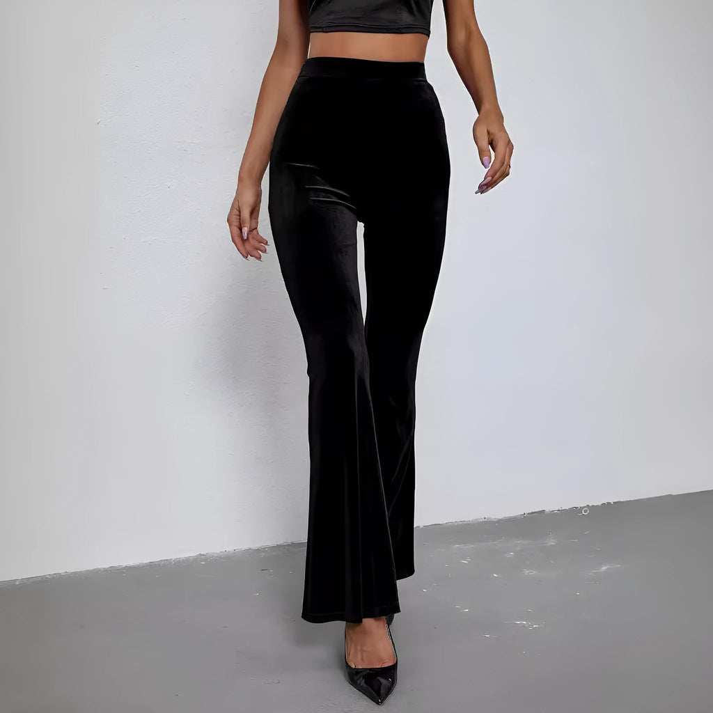 Black high-waist flared corduroy trousers for women with slim fit and slightly elastic fabric
