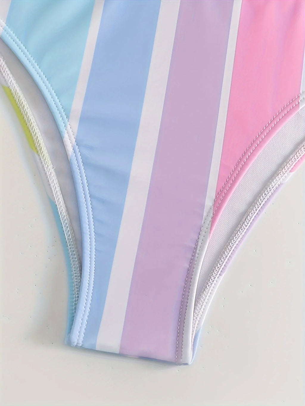Women's striped briefs-style bikini in picture colour, made from polyester and spandex.
