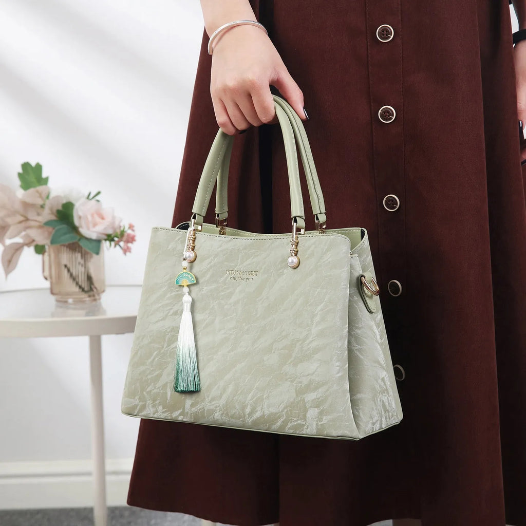 Women's PU leather shoulder bag with square shape and ethnic pattern in four colours