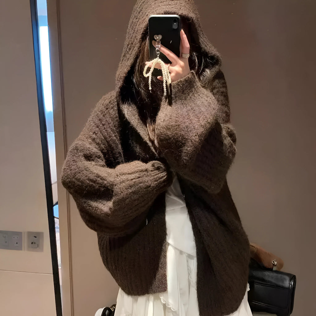 Women's dark grey retro-style hooded sweater cardigan on a hanger.