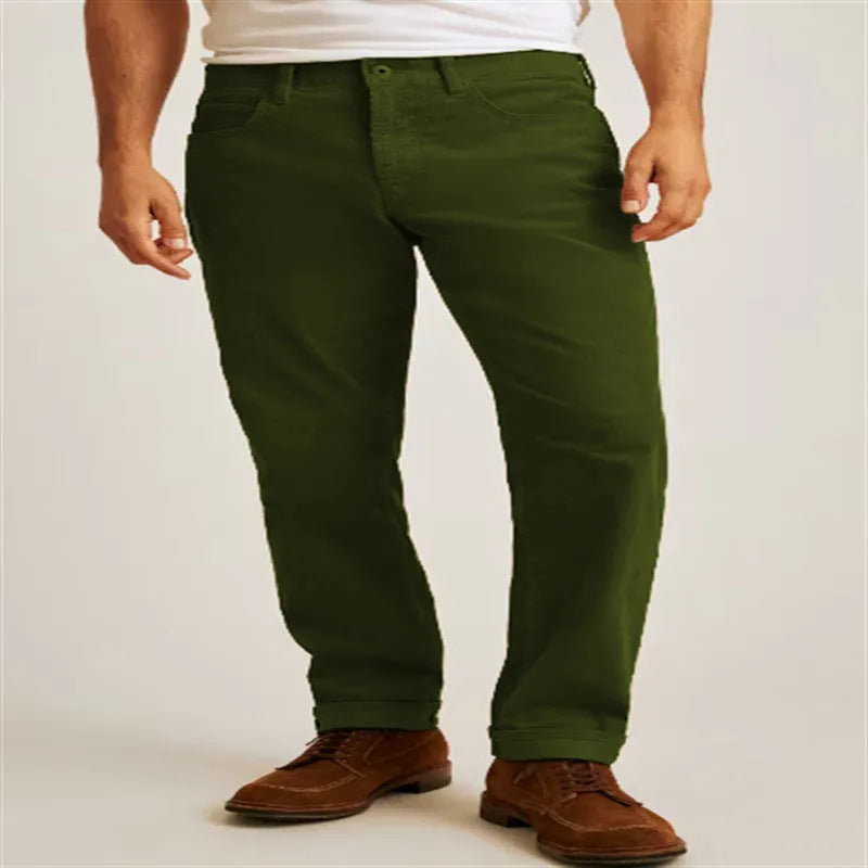 Men's solid colour corduroy trousers in a straight leg, loose casual fit on a hanger.
