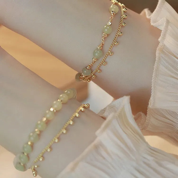 Escape Princess Natural Hetian Jade Bracelet showing beaded design with Princess Running elements