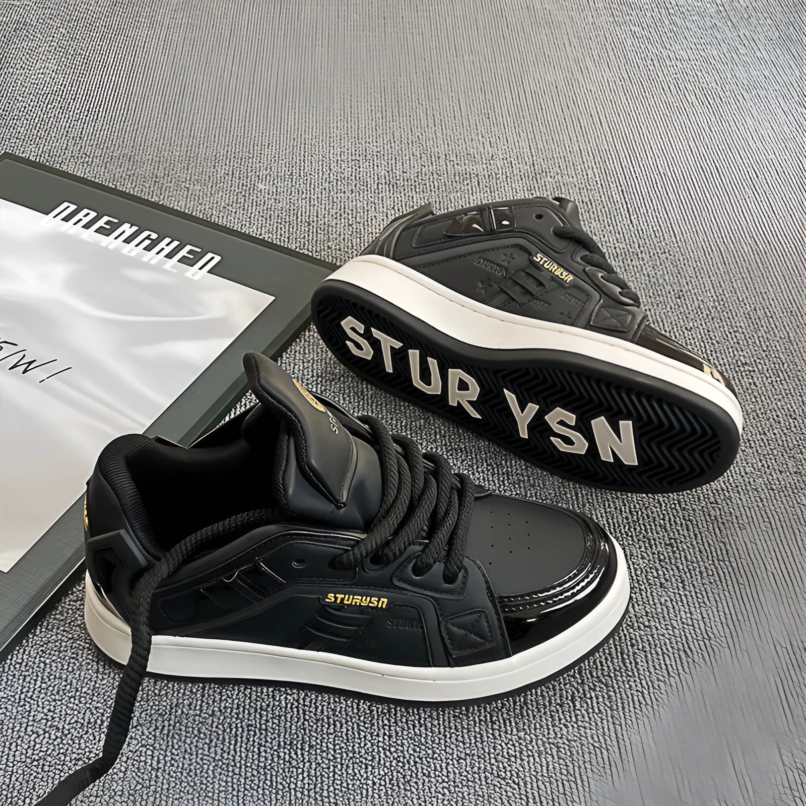 Men's black thick bottom board shoes with PU leather upper and rubber sole on a light background