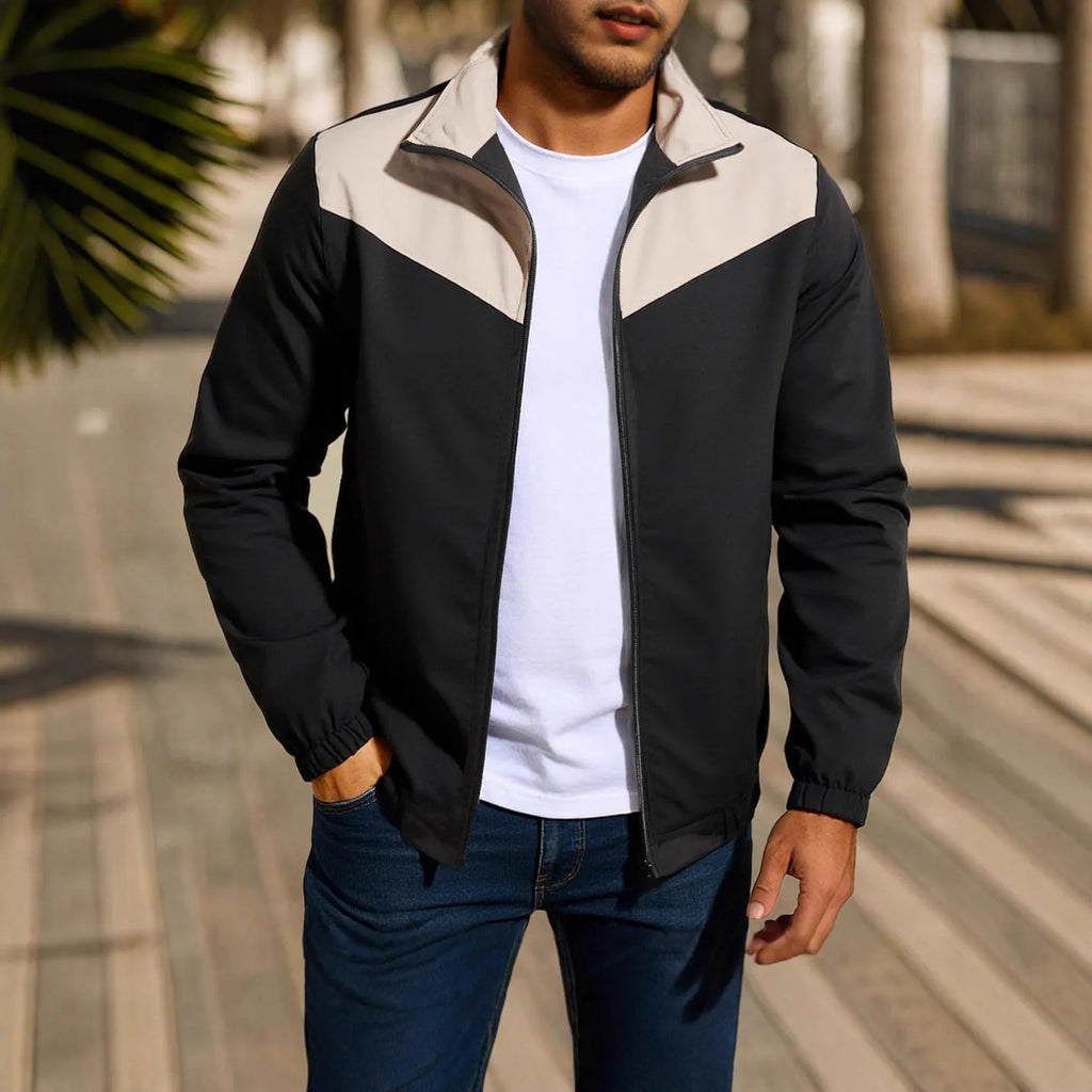 Men's red windproof jacket with high collar and zip, showing raglan sleeve design.