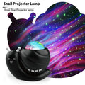 Blue snail-shaped USB projection night light with remote control on a table