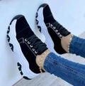 Women's platform lace-up sneaker with rubber sole, round toe, and thick platform in solid red colour