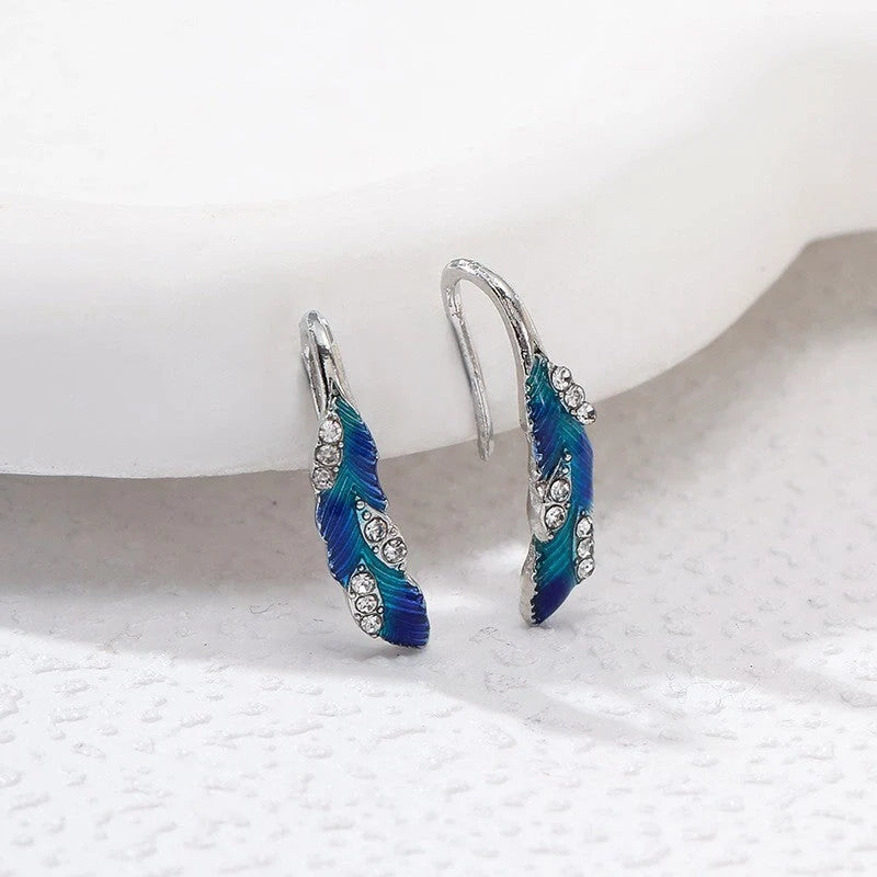 Bright blue feather earring and ring set in alloy with geometric design
