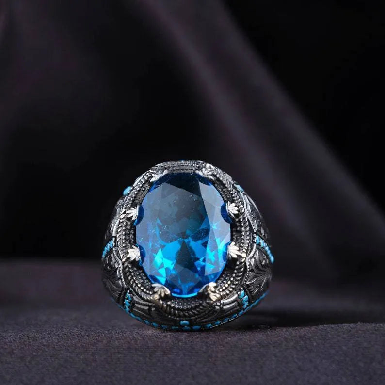 Antique silver geometric couple ring with blue zircon stone centrepiece showing European and American styling