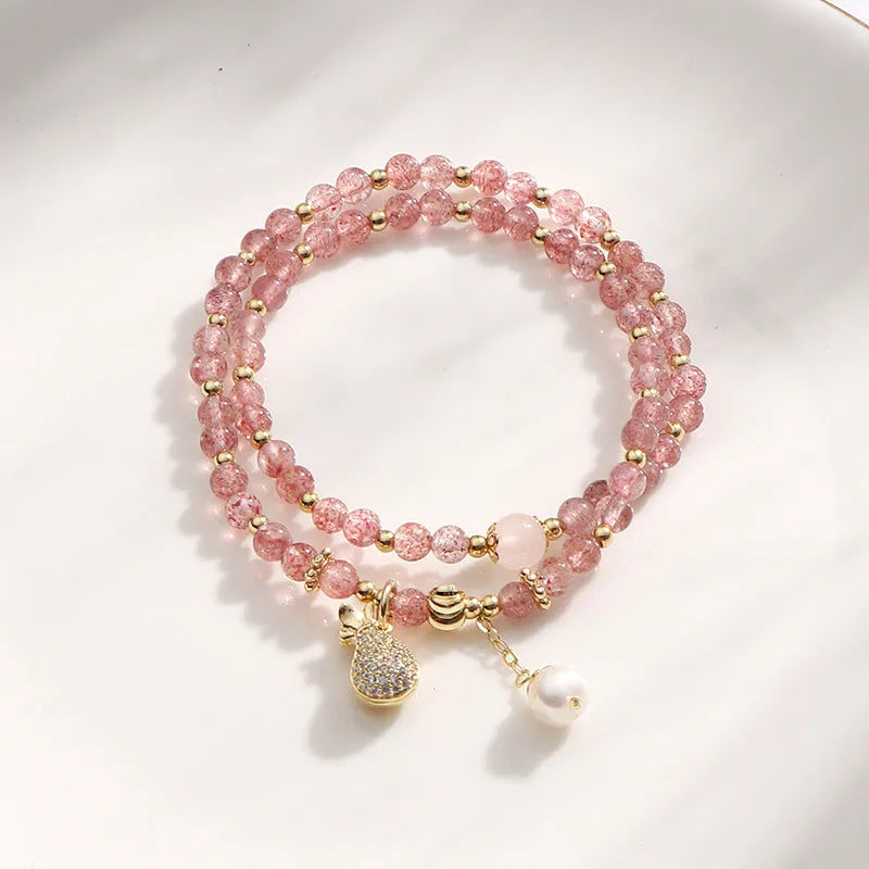 Women's geometric strawberry quartz crystal bracelet for money drawing