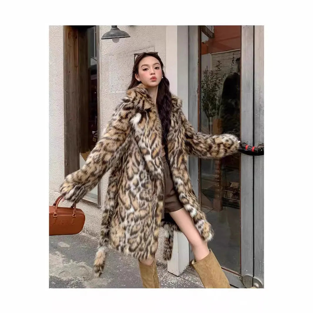Faux fur street fashion coat with fur collar in long style with regular sleeves and pockets