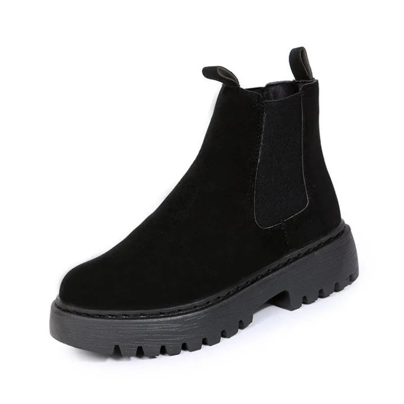 Women's Martin boots in solid colour with chunky platform sole, flat heel, and leather stitching