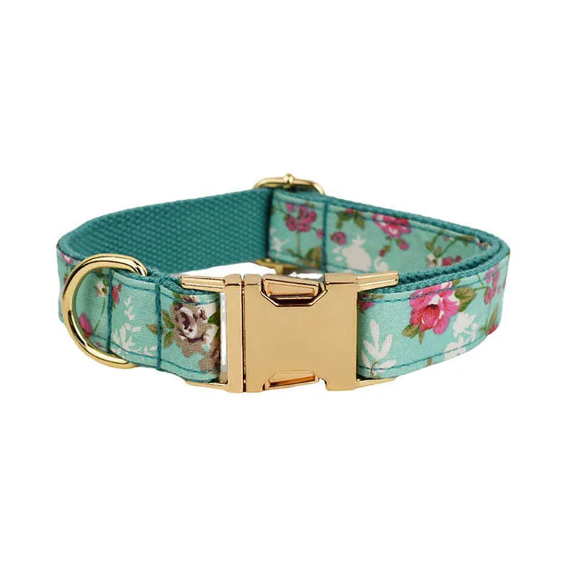 Rose pattern dog collar set with green background including collar, leash, and detachable bow