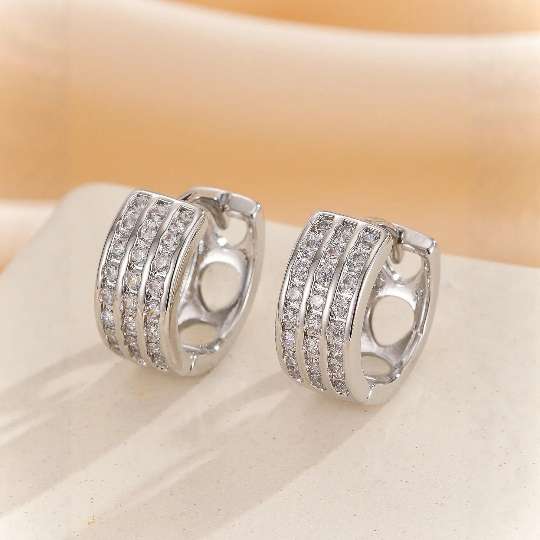 Silver-tone metal ear buckle with clear cubic zirconia stone for women, two style options available
