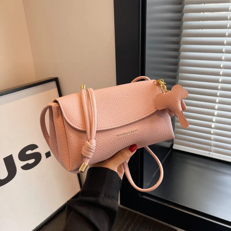 Soft PU leather small shoulder bag in khaki, pillow shape, 21cm width, with visible sewing thread details