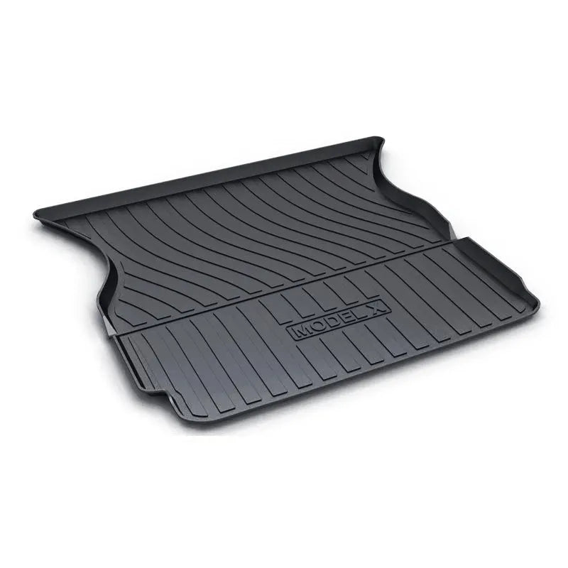 Rubber floor mat for Tesla car with TPE footrest section.