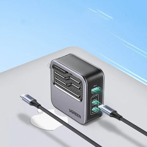 100W Gallium Nitride multi-port fast charger plug on a white background.
