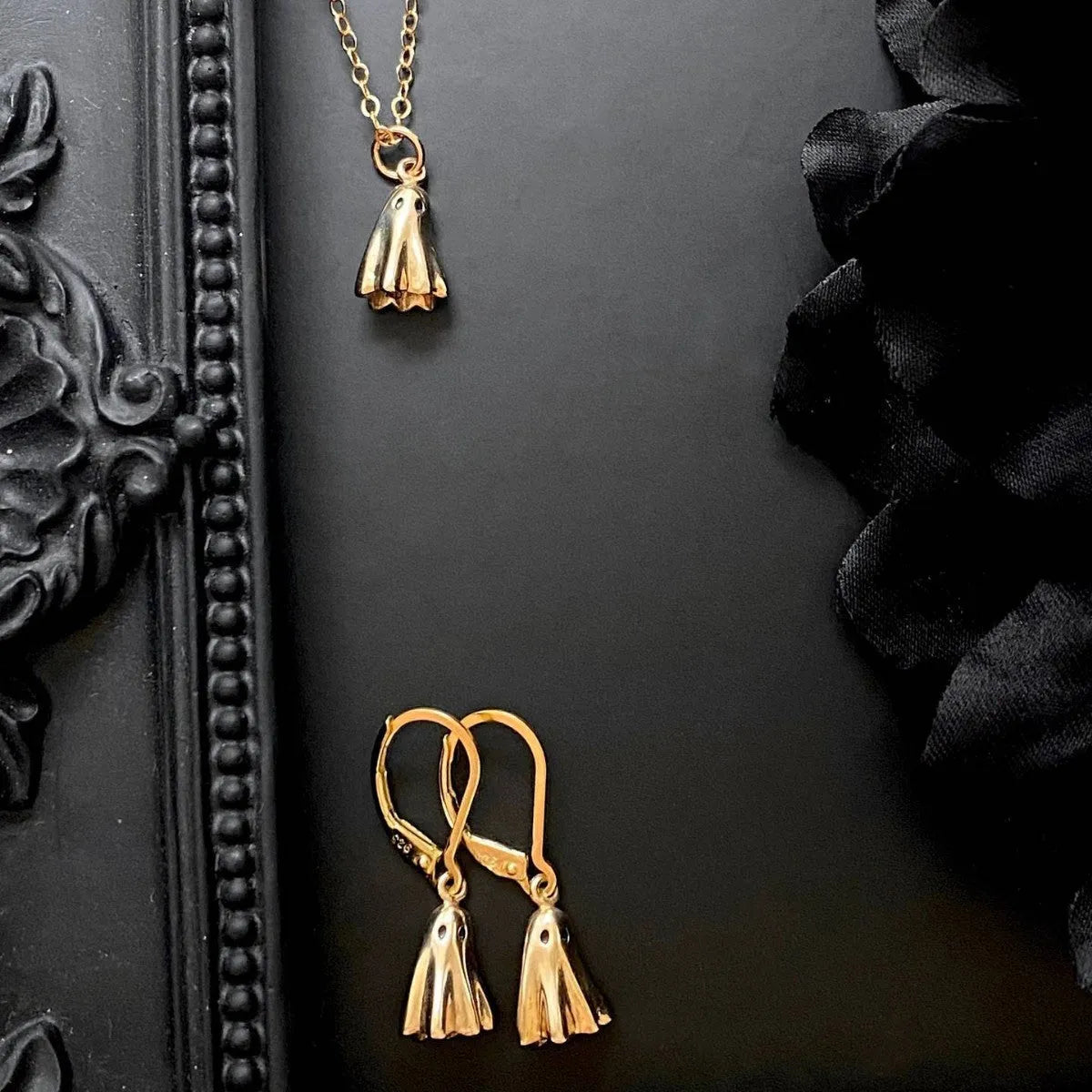 Electroplated titanium steel ghost pendant necklace with stainless steel chain options