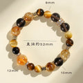 Natural yellow artificial crystal bracelet with 10mm tower beads on wrist