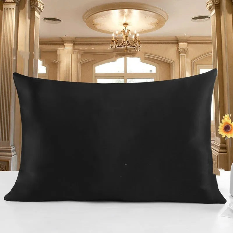 19 M double-sided silk pillowcase shown in one of 14 colours, including apricot, champagne, and navy blue.