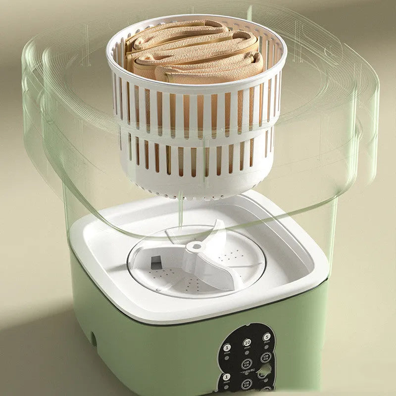 Green foldable mini portable washing machine with drain pipe and basket on a white background.
