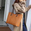 Women's genuine leather crossbody bag in horizontal square design with multiple internal compartments